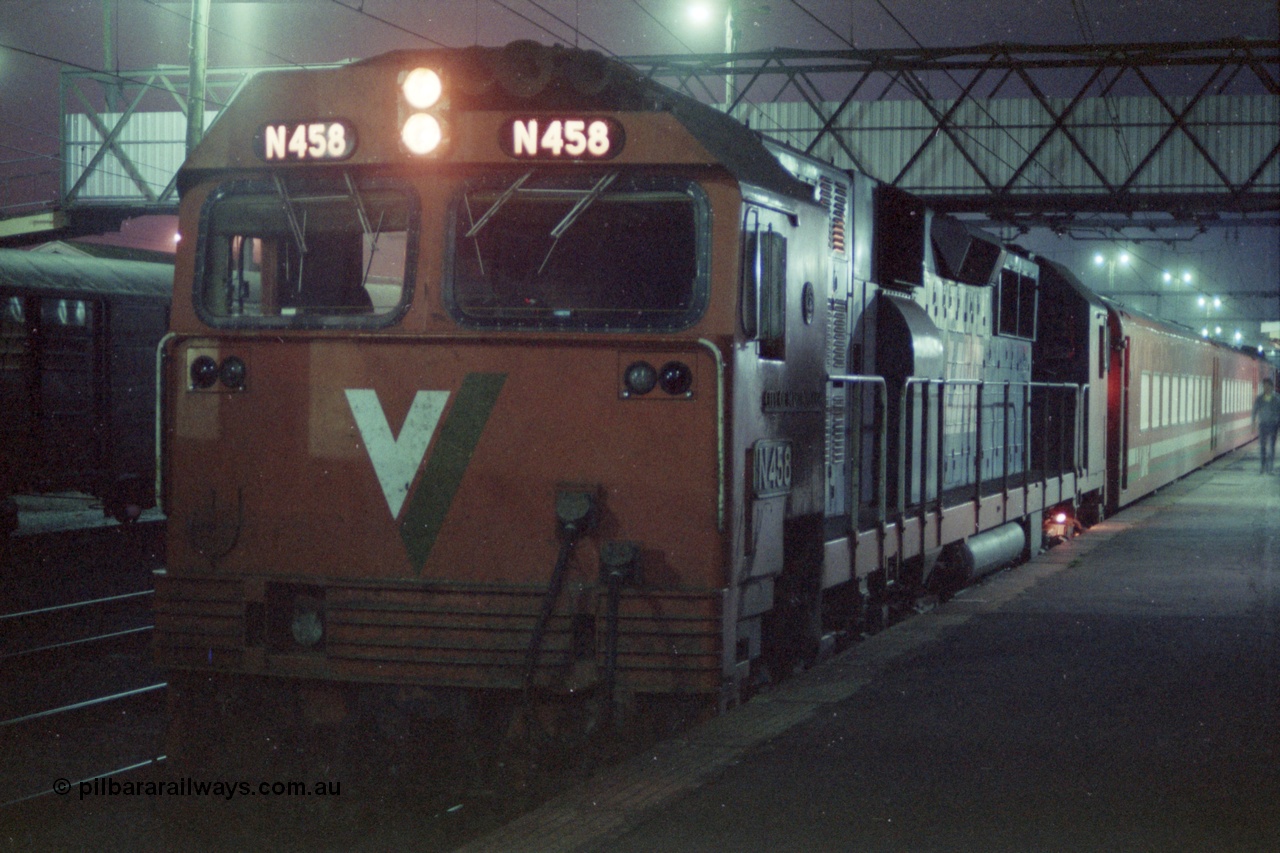 151-19
Traralgon station platform, V/Line broad gauge N class N 458 'City of Maryborough' Clyde Engineering EMD model JT22HC-2 serial 85-1226 and N set await departure with 8406 up passenger train.
Keywords: N-class;N458;Clyde-Engineering-Somerton-Victoria;EMD;JT22HC-2;85-1226;