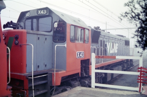 151-21
Traralgon station platform, V/Line broad gauge light engine 2nd unit X class X 43 Clyde Engineering EMD model G26C serial 70-706 awaits departure time for Morwell with 9444 light engine, then loaded briquette train for Nth Geelong, in heavy fog.
Keywords: X-class;X43;Clyde-Engineering-Granville-NSW;EMD;GT26C;70-706;