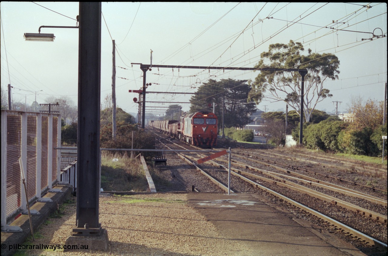 152-08
Morwell station yard, V/Line broad gauge train 9444 goods to Nth Geelong arrives into the yard from the briquette sidings behind G class G 543 Clyde Engineering EMD model JT26C-2SS serial 89-1276 and X class X 43 Clyde Engineering EMD model G26C serial 70-706, taken from station platform, auxiliary frame and signals for sidings visible .
Keywords: G-class;G543;Clyde-Engineering-Somerton-Victoria;EMD;JT26C-2SS;89-1276;