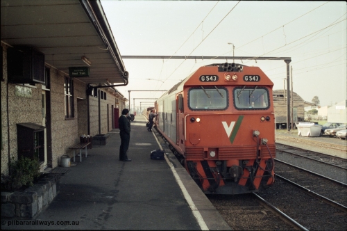 152-14
Pakenham station platform, V/Line broad gauge up 9444 goods to Nth Geelong with G class G 543 Clyde Engineering EMD model JT26C-2SS serial 89-1276 and X class X 43 Clyde Engineering EMD model G26C serial 70-706 has a crew change at the platform.
Keywords: G-class;G543;Clyde-Engineering-Somerton-Victoria;EMD;JT26C-2SS;89-1276;