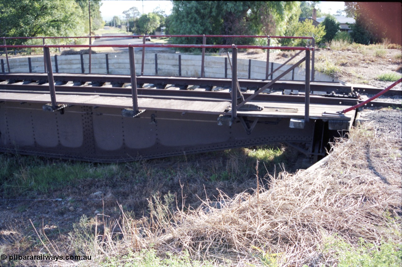 153-1-23
Bacchus Marsh turntable looking at lever end interlock and side, shows walkway and underframe.
