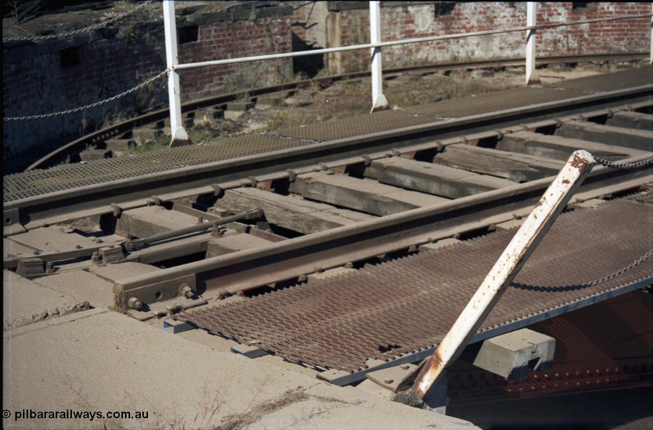 153-2-11
Ballarat East loco depot turntable, shows interlocking and walkway.
