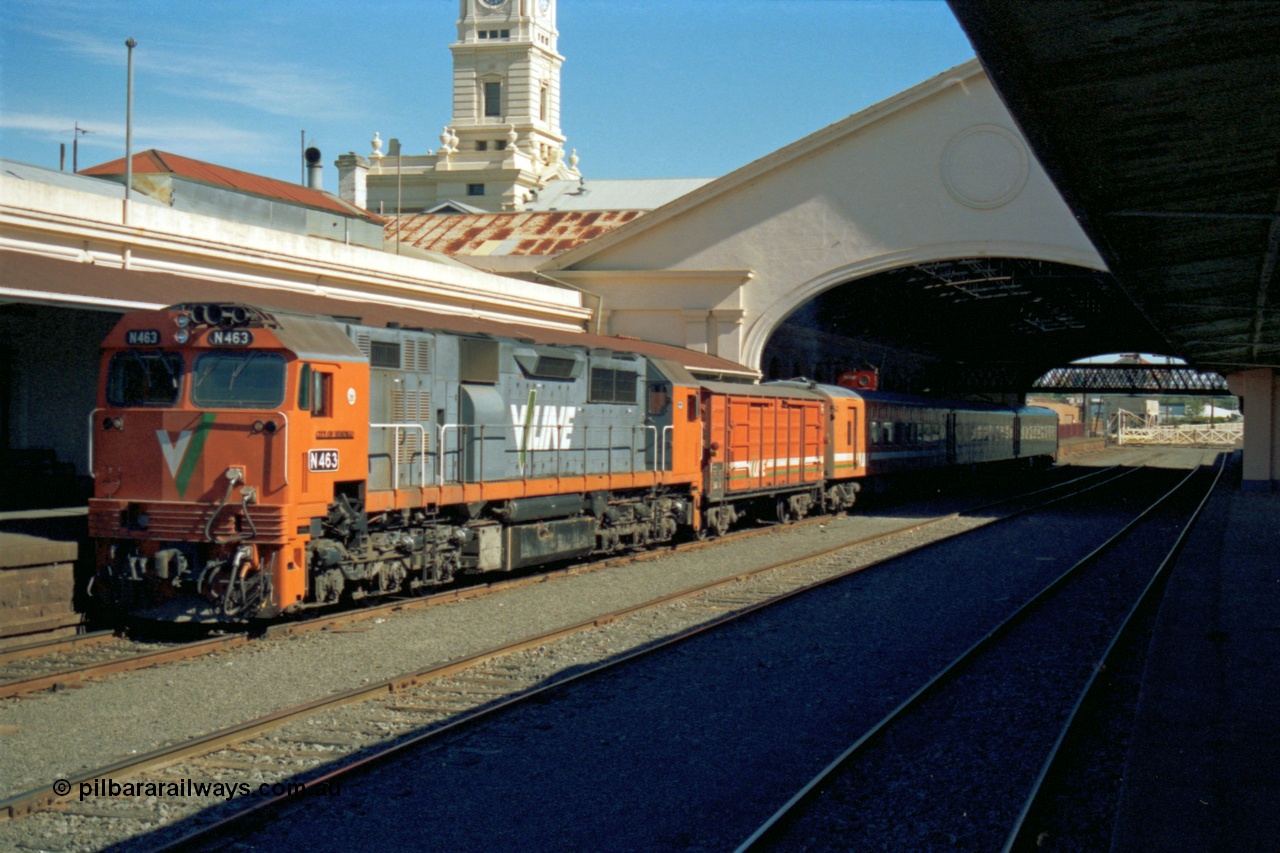 153-2-13
Ballarat station and canopy, broad gauge V/Line N class N 463 'City of Bendigo' Clyde Engineering EMD model JT22HC-2 serial 86-1192, D van and N set with a Melbourne bound up passenger train.
Keywords: N-class;N463;Clyde-Engineering-Somerton-Victoria;EMD;JT22HC-2;86-1192;