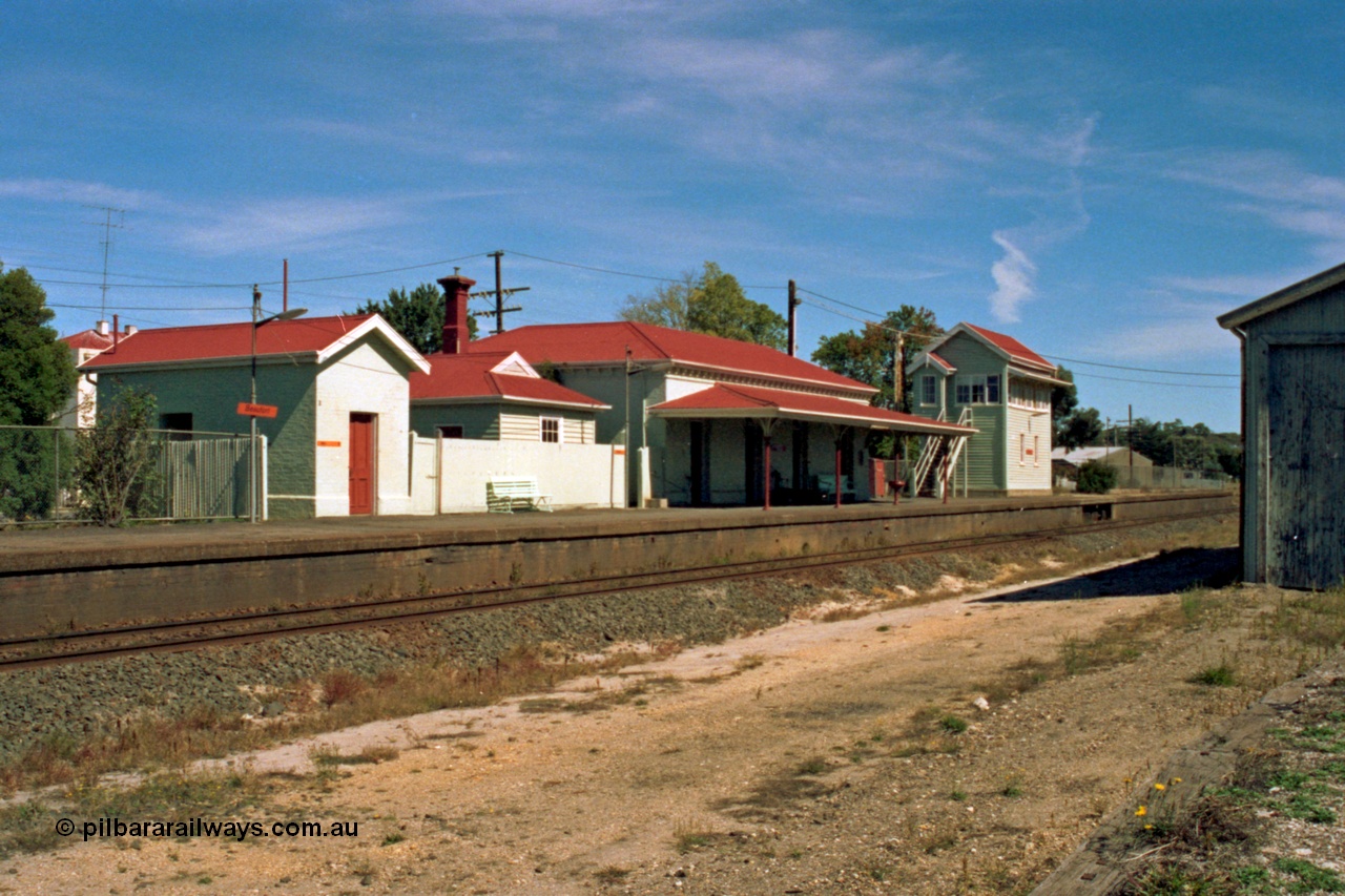 153-2-23
Beaufort station overview, station buildings, platform, elevated signal box, goods shed at right.
