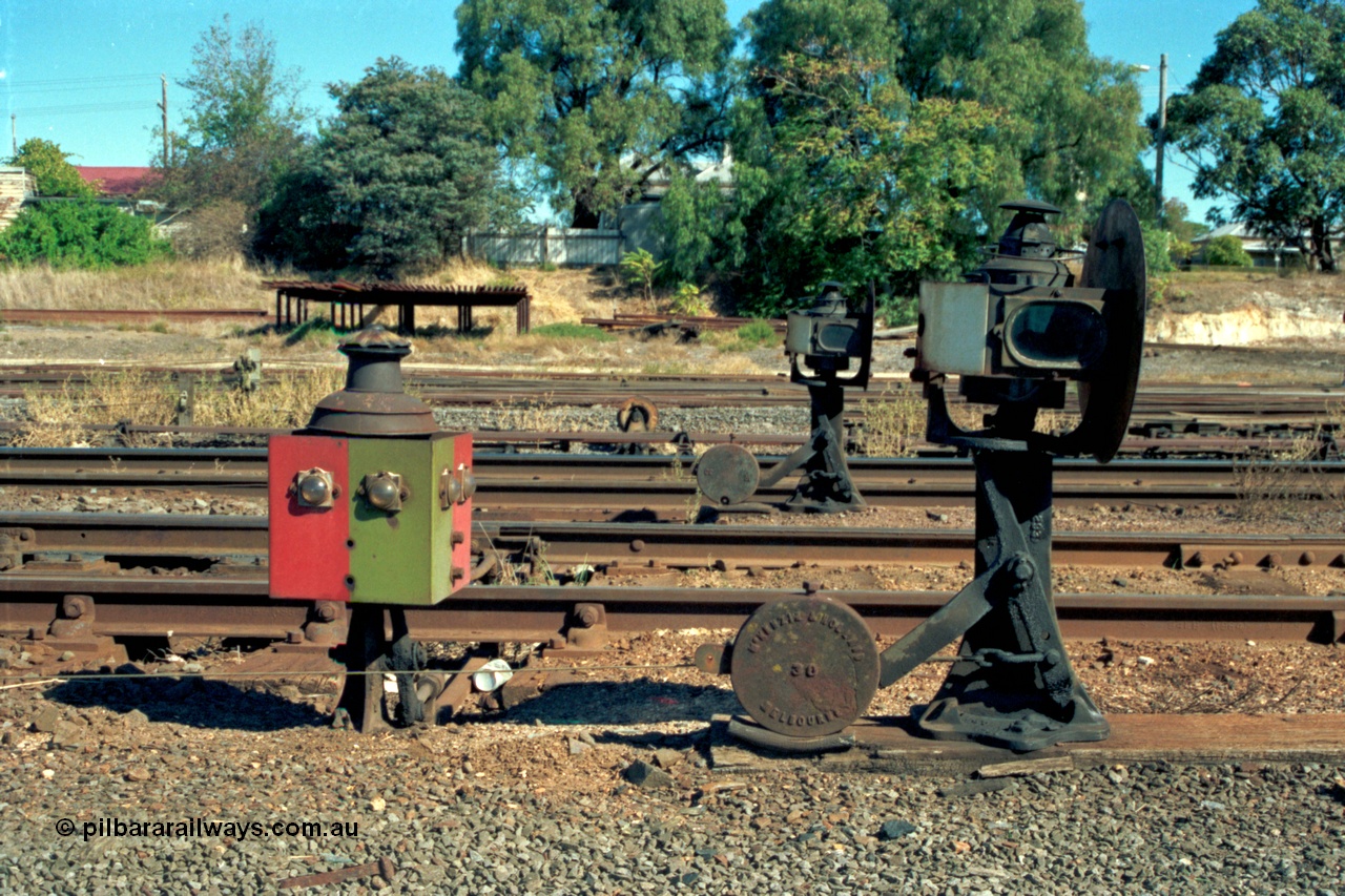 153-2-32
Ararat station yard, ground dwarf disc signals 14 from 9-16 Rds New Goods Yard, and 15 from 8 Rd New Goods Yard, with a point indicator, side view shows interlocking, rodding and wires.
