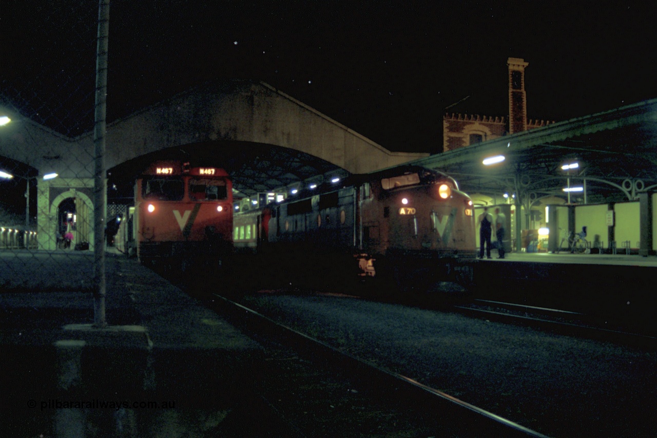 153-3-23
Geelong station building and platform, night shot, V/Line broad gauge passenger train, down Warrnambool with A class A 70 Clyde Engineering EMD model AAT22C-2R serial 84-1187 rebuilt from B 70 Clyde Engineering EMD model ML2 serial ML2-11 pauses at platform one with N class N 467 'City of Stawell' Clyde Engineering EMD model JT22HC-2 serial 86-1196 in platform two.
Keywords: A-class;A70;Clyde-Engineering-Rosewater-SA;EMD;AAT22C-2R;84-1187;rebuild;bulldog;