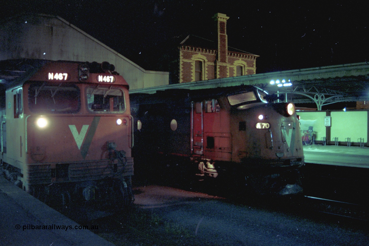 153-3-25
Geelong station building and platform, night shot, V/Line broad gauge passenger train, down Warrnambool with A class A 70 Clyde Engineering EMD model AAT22C-2R serial 84-1187 rebuilt from B 70 Clyde Engineering EMD model ML2 serial ML2-11 pauses at platform one with N class N 467 'City of Stawell' Clyde Engineering EMD model JT22HC-2 serial 86-1196 in platform two, cab shot.
Keywords: A-class;A70;Clyde-Engineering-Rosewater-SA;EMD;AAT22C-2R;84-1187;rebuild;bulldog;