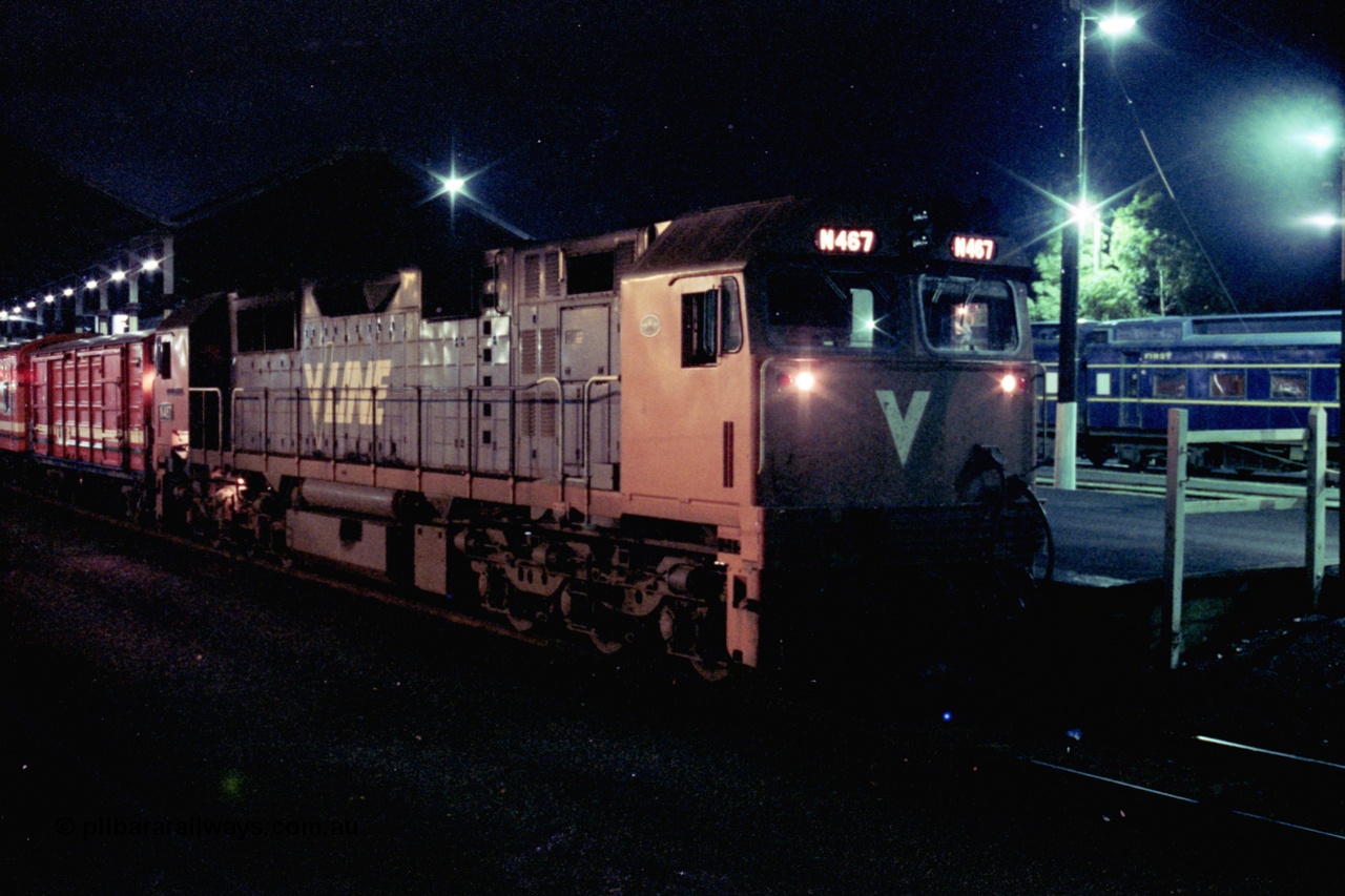 153-3-26
Geelong station platform two, V/Line broad gauge N class N 467 'City of Stawell' Clyde Engineering EMD model JT22HC-2 serial 86-1196 prepares to couple to a D van on up passenger train.
Keywords: N-class;N467;Clyde-Engineering-Somerton-Victoria;EMD;JT22HC-2;86-1196;