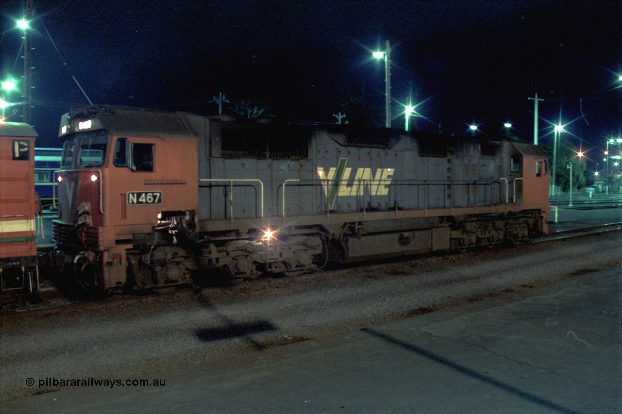 153-3-27
Geelong station platform two, V/Line broad gauge N class N 467 'City of Stawell' Clyde Engineering EMD model JT22HC-2 serial 86-1196 with D van readies an up passenger train.
Keywords: N-class;N467;Clyde-Engineering-Somerton-Victoria;EMD;JT22HC-2;86-1196;