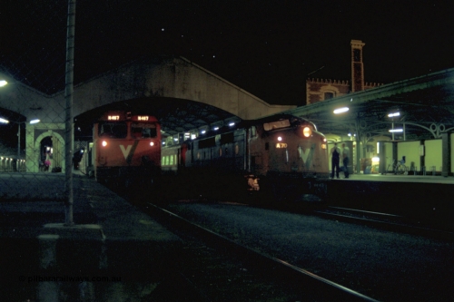 153-3-23
Geelong station building and platform, night shot, V/Line broad gauge passenger train, down Warrnambool with A class A 70 Clyde Engineering EMD model AAT22C-2R serial 84-1187 rebuilt from B 70 Clyde Engineering EMD model ML2 serial ML2-11 pauses at platform one with N class N 467 'City of Stawell' Clyde Engineering EMD model JT22HC-2 serial 86-1196 in platform two.
Keywords: A-class;A70;Clyde-Engineering-Rosewater-SA;EMD;AAT22C-2R;84-1187;rebuild;bulldog;