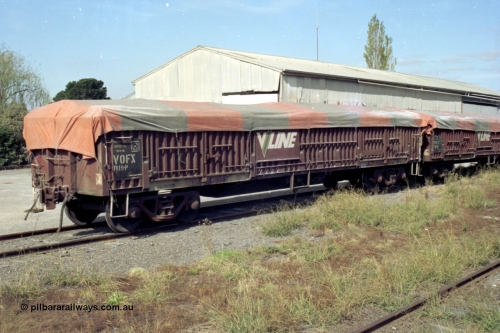 153-3-33
Coldstream, V/Line VOFX type bogie open waggon VOFX 1119 loaded with super phosphate and tarpaulin fitted, built by Victorian Railways Bendigo Workshops as an VOCX type in a batch of seventy in 1978-79.
Keywords: VOFX-type;VOFX1119;Victorian-Railways-Bendigo-WS;VOCX-type;