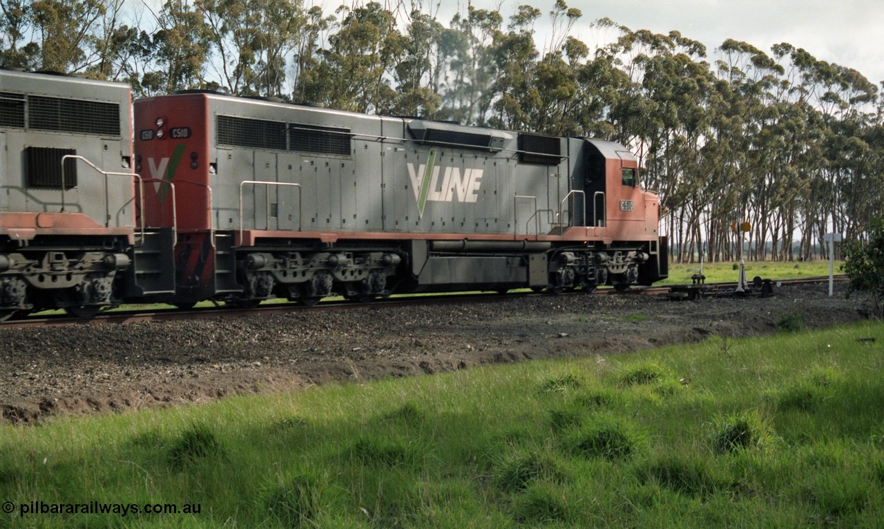 154-11
Lismore, V/Line broad gauge C class locomotive C 510 Clyde Engineering EMD model GT26C serial 76-833 arrives at the trailable points which are set for left hand lay, curve board, point indicator and lever in front of loco.
Keywords: C-class;C510;Clyde-Engineering-Rosewater-SA;EMD;GT26C;76-833;