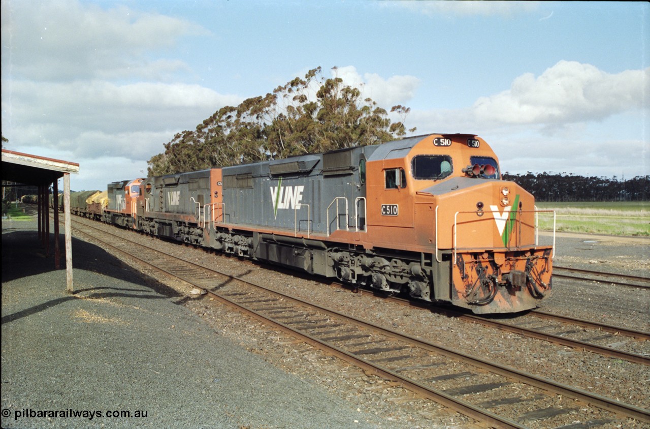 154-14
Lismore, V/Line broad gauge C class locomotive C 510 Clyde Engineering EMD model GT26C serial 76-833 leads Adelaide bound goods train 9169 with C 508 serial 76-831 and C class leader C 501 'George Brown' serial 76-824, paused on No.2 Rd opposite the station building to obtain a new train order from Lismore to Ararat.
Keywords: C-class;C510;Clyde-Engineering-Rosewater-SA;EMD;GT26C;76-833;