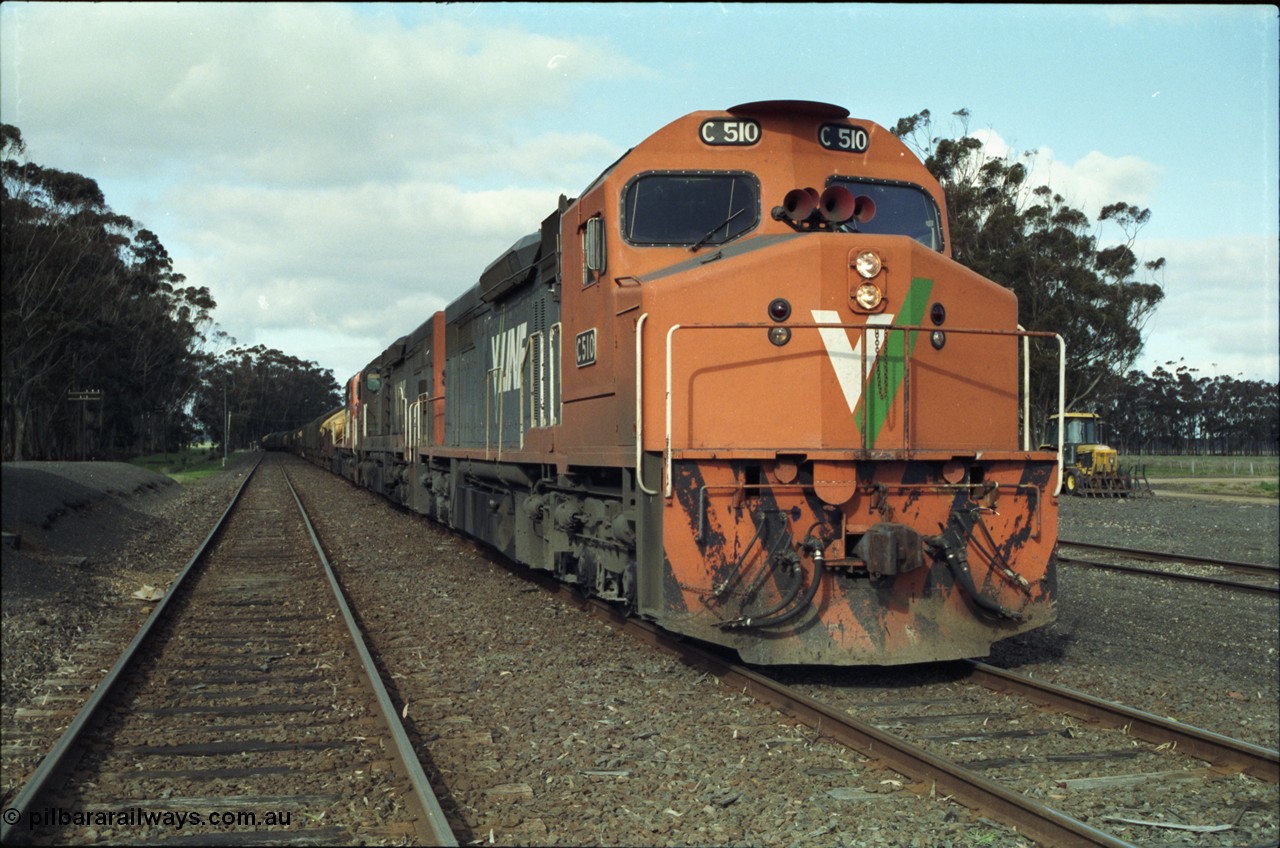 154-16
Lismore, V/Line broad gauge C class locomotive C 510 Clyde Engineering EMD model GT26C serial 76-833 leads Adelaide bound goods train 9169 with C 508 serial 76-831 and C class leader C 501 'George Brown' serial 76-824, paused on No.2 Rd opposite the station building to obtain a new train order from Lismore to Ararat.
Keywords: C-class;C510;Clyde-Engineering-Rosewater-SA;EMD;GT26C;76-833;