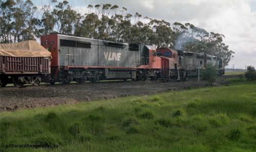 154-12
Lismore, V/Line broad gauge C class locomotives C 510 Clyde Engineering EMD model GT26C serial 76-833, C 508 serial 76-831 and C class leader C 501 'George Brown' serial 76-824 power into No.2 Rd with Adelaide bound goods train 9169 through the trailable points, point indicator and curve board are visible beside C 508.
Keywords: C-class;C501;Clyde-Engineering-Rosewater-SA;EMD;GT26C;76-824;