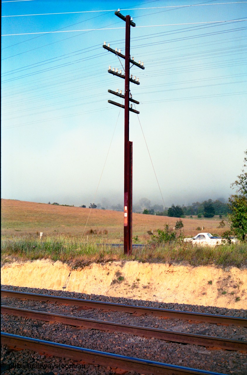 156-06
Metal telegraph pole and wires, some where on the North East mainlines?
