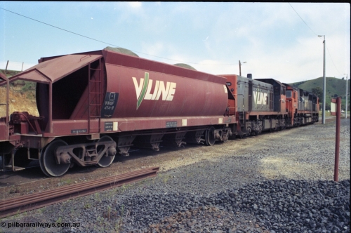 157-24
Kilmore East, Apex Quarry Siding, V/Line VHQF type bogie quarry products waggon VHQF 414 originally built by Ballarat North Workshops in February 1977 as JQF type, to VHQY in 1979 and VHQF in 1988, trailing view taken from ballast pile.
Keywords: VHQF-type;VHQF414;Victorian-Railways-Ballarat-Nth-WS;JQF-type;VHQY-type;