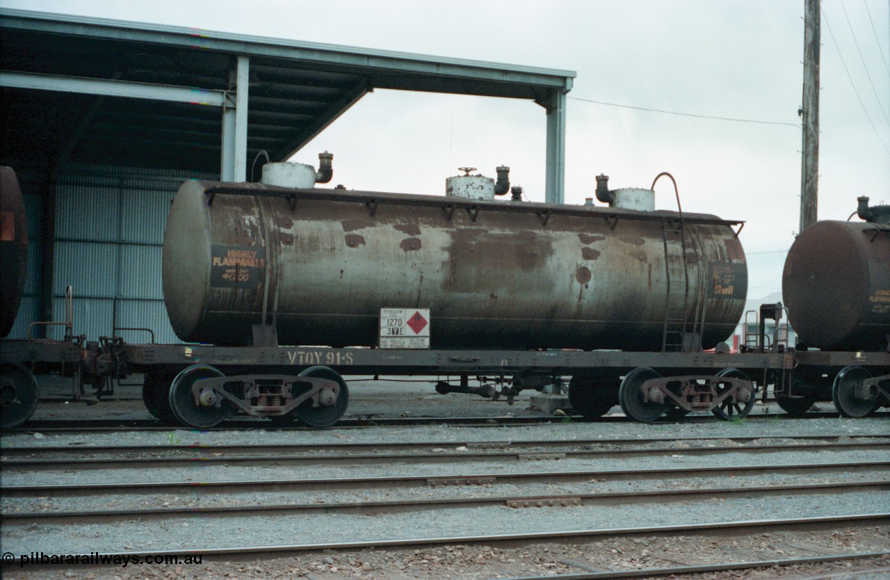 160-19
Shepparton, V/Line broad gauge VTQY type bogie fuel tank waggon VTQY 91 on the stabled down fuel train, note the disc and spoke wheel sets on the RHS bogie, this tank waggon was built by Victorian Railways Newport Workshops in April 1928, coded to TWF in 1961 then to VTQY in November 1981.
Keywords: VTQY-type;VTQY91;Victorian-Railways-Newport-WS;OT-type;