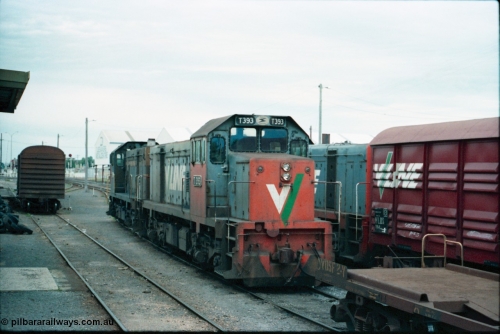 160-22
Shepparton, yard view of stabled broad gauge V/Line locos T class T 393 Clyde Engineering EMD model G8B serial 65-423 and T 385 serial 64-340 still in Victorian Railways blue and yellow off the down Shepparton fuel train in No.4 Rd, taken from goods shed platform looking north.
Keywords: T-class;T393;Clyde-Engineering-Granville-NSW;EMD;G8B;65-423;