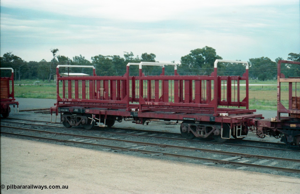 161-28
Tocumwal, V/Line broad gauge VZSX type bogie sleeper container waggon VZSX 100 converted from a VLCX / VLX type louvre van between 1987-89, with empty VWS type sleeper transport containers VWS 001 and VWS 009.
Keywords: VZSX-type;VZSX100;VLX-type;