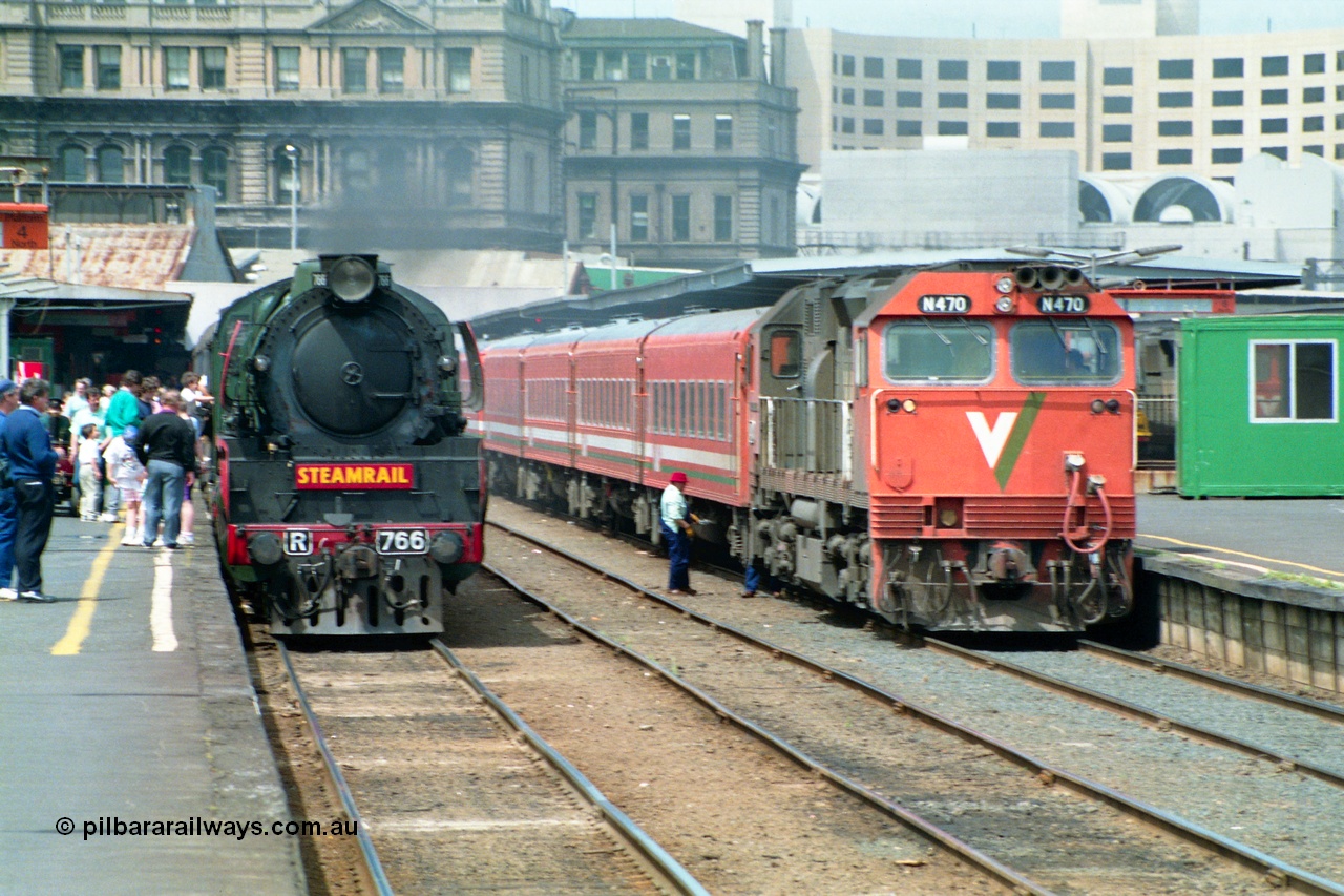 162-1-15
Spencer Street Station, platforms 4 and 5 view, broad gauge Steamrail R class loco R 766 North British Locomotive Company, Glasgow, Scotland model Hudson serial 27056 and V/Line N class N 470 'City of Wangaratta' Clyde Engineering EMD model JT22HC-2 serial 86-1199 during the PTC Open Day.
Keywords: R-class;R766;North-British-Locomotive-Company;Hudson;27056;