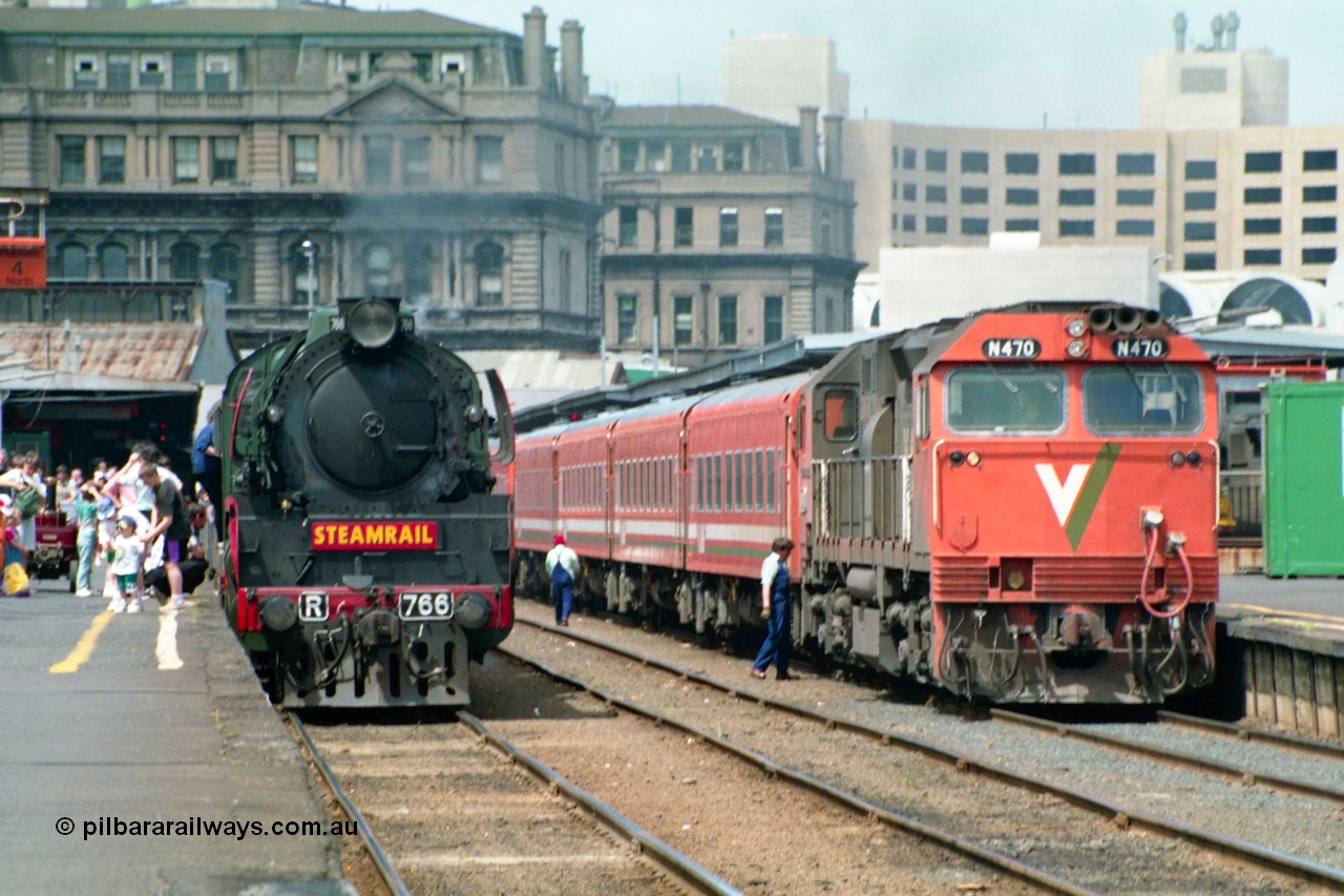 162-1-16
Spencer Street Station, platforms 4 and 5 view, broad gauge Steamrail R class loco R 766 North British Locomotive Company, Glasgow, Scotland model Hudson serial 27056 and V/Line N class N 470 'City of Wangaratta' Clyde Engineering EMD model JT22HC-2 serial 86-1199 during the PTC Open Day.
Keywords: R-class;R766;North-British-Locomotive-Company;Hudson;27056;