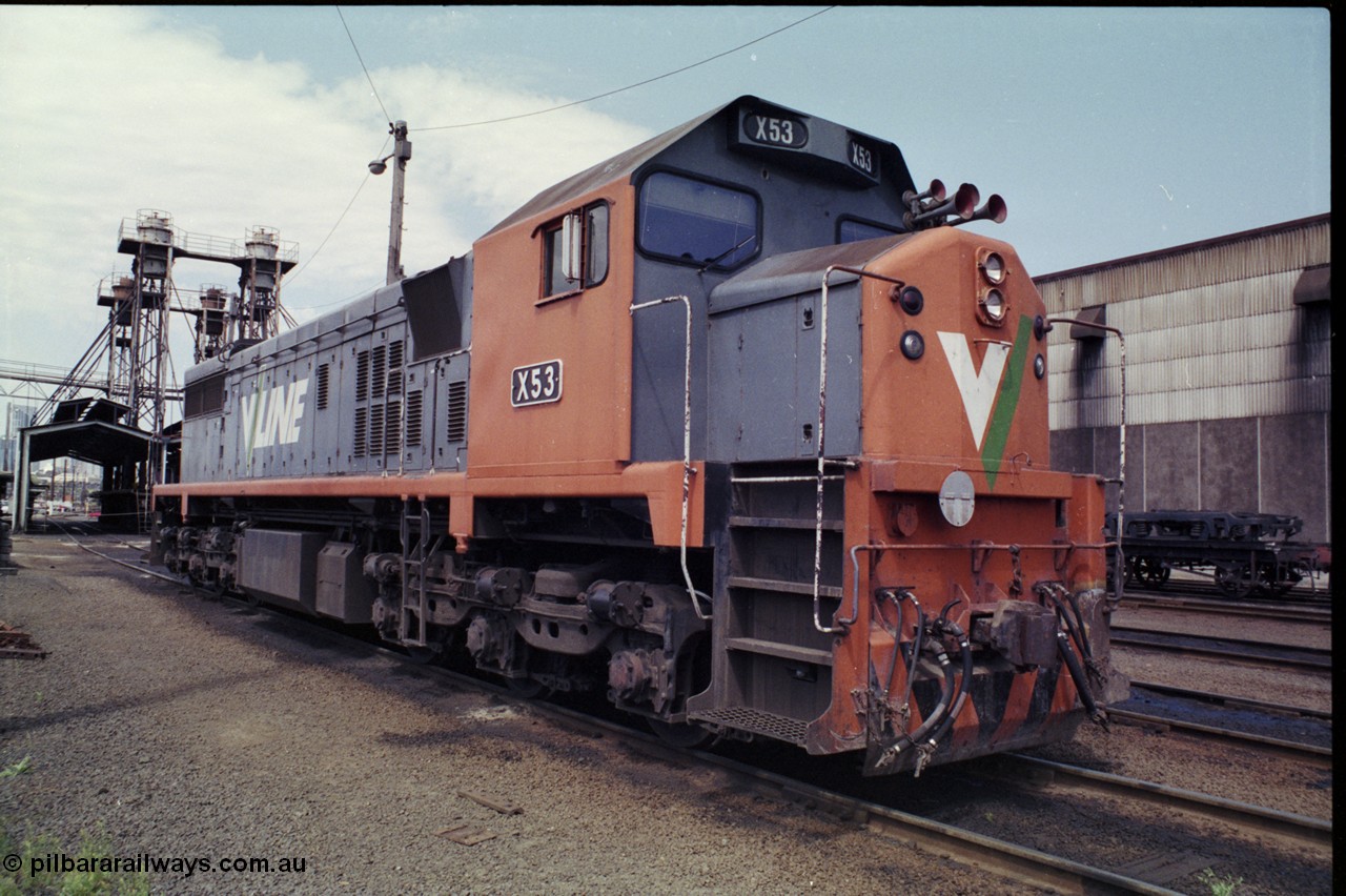 162-2-03
South Dynon Motive Power Depot, broad gauge diesel electric locomotive V/Line X class loco X 53 with serial 75-800 a Clyde Engineering Rosewater SA built EMD model G26C of the third series, in front of the fuel point, the maintenance building is at right, PTC Open Day.
Keywords: X-class;X53;Clyde-Engineering-Rosewater-SA;EMD;G26C;75-800;