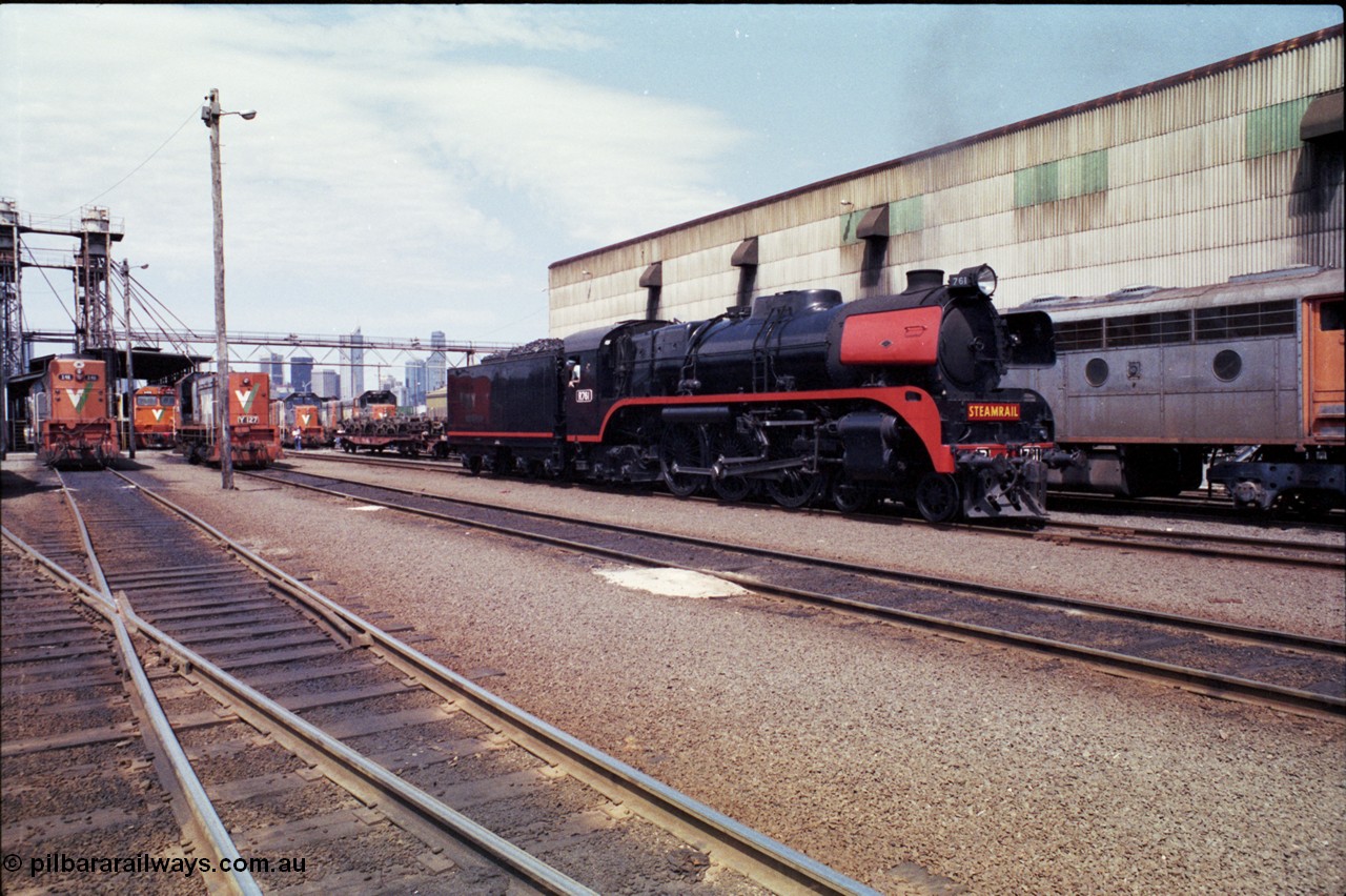 162-2-05
South Dynon Motive Power Depot, overview looking east towards the broad gauge fuel point from behind the maintenance building, Steamrail R class R 761 North British Locomotive Company, Glasgow, Scotland model Hudson serial 27051 shunts past the stored B class, locos in the distance are V/Line X class X 46 Clyde Engineering EMD model G26C serial 75-793, N class N 458 'City of Maryborough' Clyde Engineering EMD model JT22HC-2 serial 85-1226, Y class Y 127 Clyde Engineering EMD model G6B serial 65-393 and some T classes, Melbourne skyline in the distance.
Keywords: R-class;R761;North-British-Locomotive-Company;Hudson;27051;