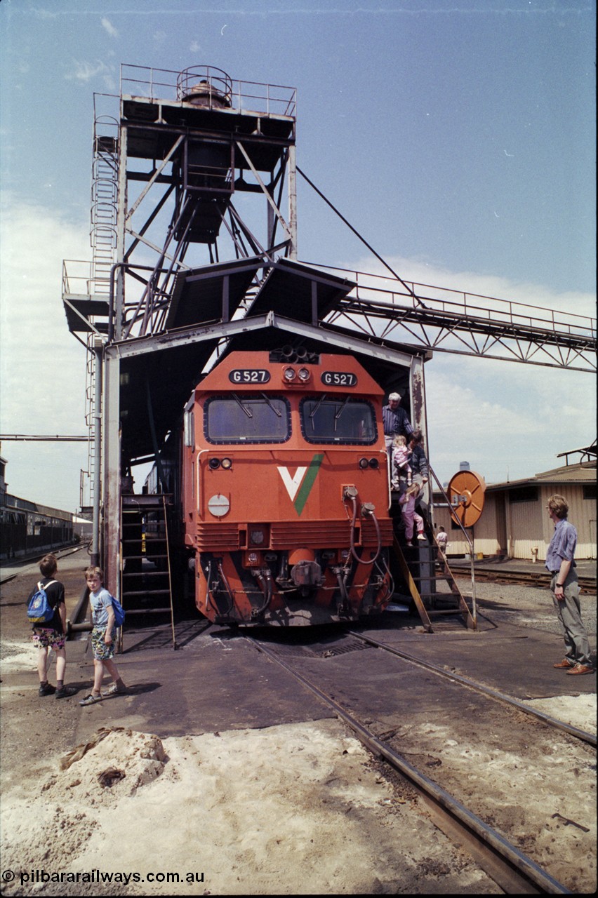 162-2-06
South Dynon Motive Power Depot standard gauge fuel point, V/Line Co-Co diesel electric locomotive G class G 527 Clyde Engineering EMD model JT26C-2SS serial 88-1257 with public, during the PTC Open Day.
Keywords: G-class;G527;Clyde-Engineering-Somerton-Victoria;EMD;JT26C-2SS;88-1257;