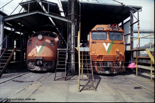 162-2-02
South Dynon Motive Power Depot broad gauge fuel point, V/Line diesel electric locomotives 'on shed' are new and re-build passenger train motive power in the form of Bulldog A class A 73 Clyde Engineering EMD model AAT22C-2R serial 83-1179 rebuilt from B class B 73 Clyde Engineering EMD model ML2 serial ML2-14, and N class N 458 'City of Maryborough' Clyde Engineering EMD model JT22HC-2 serial 85-1226 front view at the fuel point.
Keywords: A-class;A73;Clyde-Engineering-Rosewater-SA;EMD;AAT22C-2R;83-1179;rebuild;bulldog;N-class;N458;JT22HC-2;85-1226;