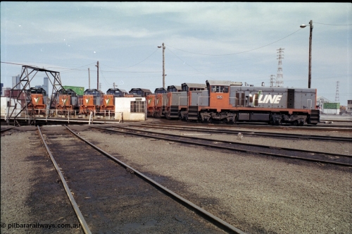162-2-21
South Dynon Motive Power Depot, broad gauge turntable and radial roads, V/Line diesel electric locomotives of the T and H classes line the roads, H class H 5 Clyde Engineering EMD model G18B serial 68-632.
Keywords: H-class;H5;Clyde-Engineering-Granville-NSW;EMD;G18B;68-632;