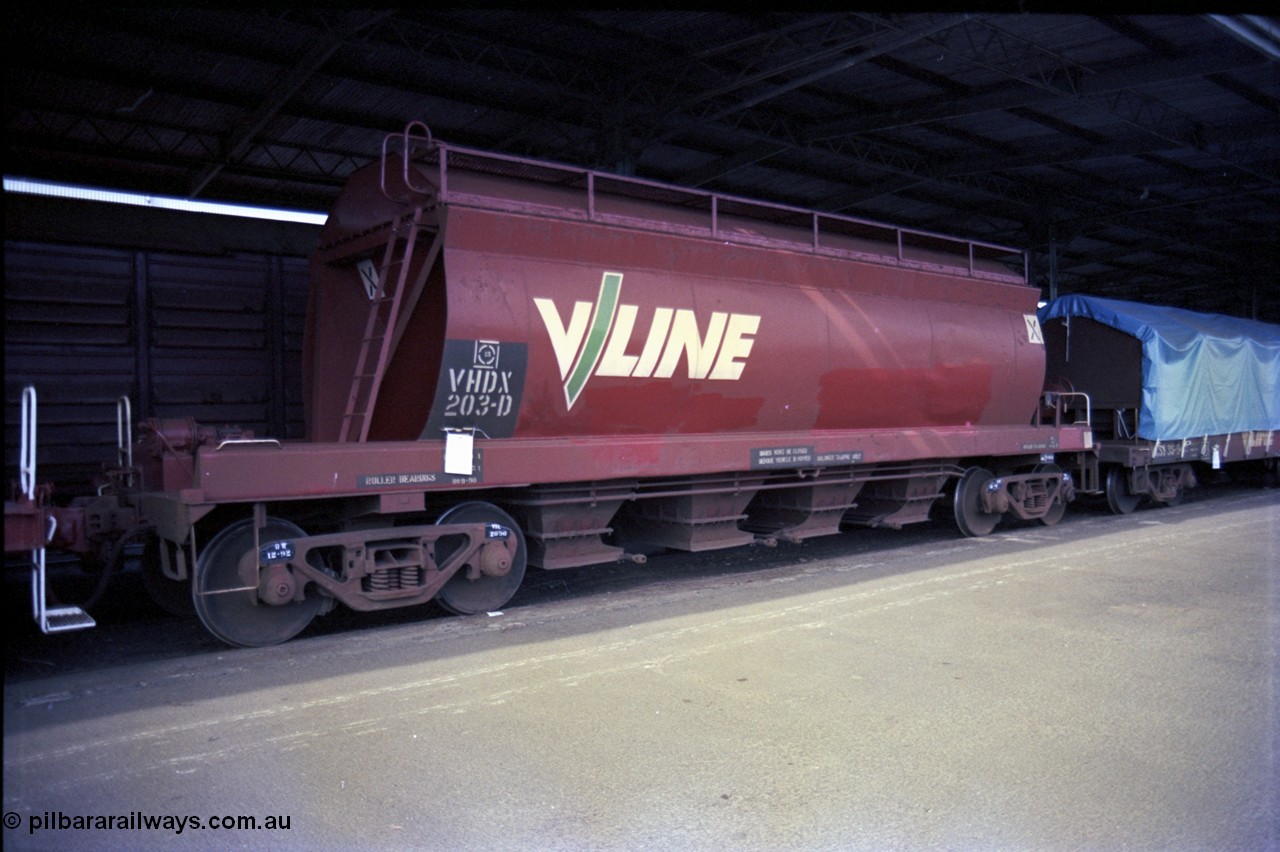 162-3-11
Melbourne Yard, No.10 Goods Shed, PTC Open Day, V/Line broad gauge VHDX type bogie dolomite waggon VHDX 203 built new as a JDX type bogie dolomite hopper at Newport Workshops in 05-1974.
Keywords: VHDX-type;VHDX203;Victorian-Railways-Newport-WS;JDX-type;