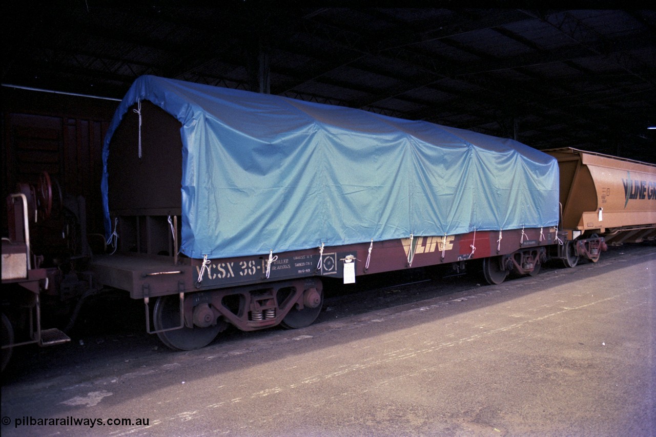 162-3-12
Melbourne Yard, No.10 Goods Shed, PTC Open Day, V/Line broad gauge VCSX type bogie coil steel waggon VCSX 38 with tarpaulin fitted, originally coded CSX and built at Ballarat North Workshops 01-1973.
Keywords: VCSX-type;VCSX38;Victorian-Railways-Ballarat-Nth-WS;CSX-type;