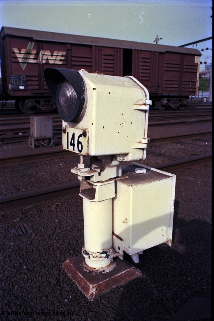 162-3-22
Melbourne Yard, ground dwarf colour light signal 146, V/Line broad gauge VLCX type bogie louvre van VLCX 134, built at Bendigo Workshops in May 1964 as an VLF type Bogie Large Louvre Van, stored.
Keywords: VLCX-type;VLCX134;Victorian-Railways-Bendigo-WS;VLF-type;