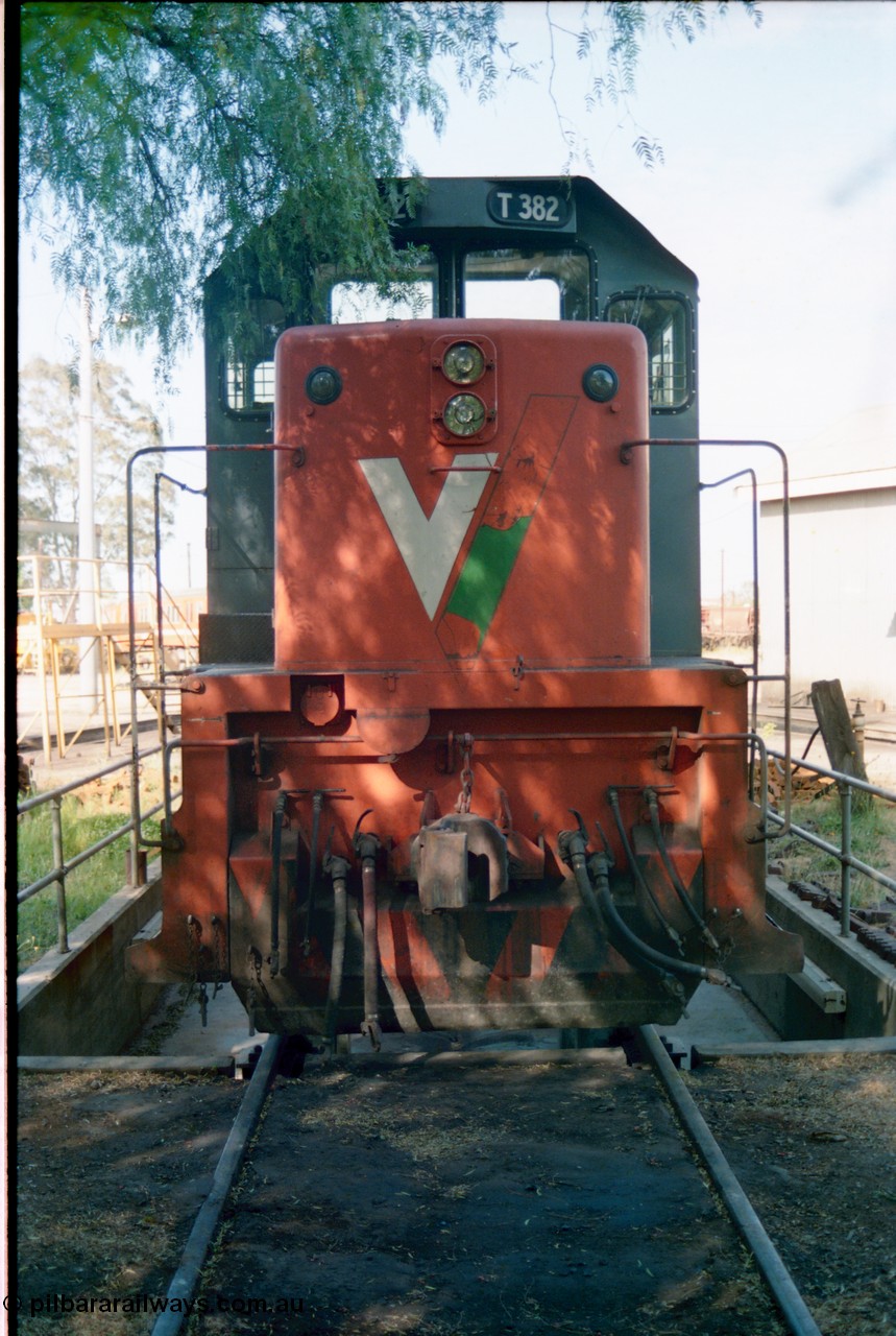 163-15
Seymour loco depot turntable roads, V/Line broad gauge T class loco T 382 Clyde Engineering EMD model G8B serial 64-337 sits over the brake pit road, cab front on view.
Keywords: T-class;T382;Clyde-Engineering-Granville-NSW;EMD;G8B;64-337;