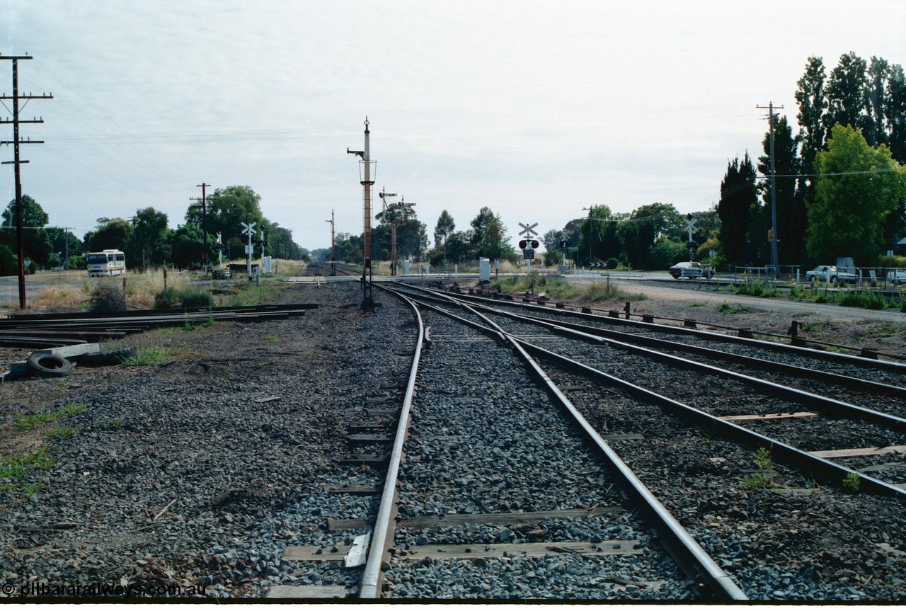 163-17
Avenal station yard overview looking north across Bank Street with Siding B removed, but still across road, and redundant and stripped disc signal posts 9 and 11, double semaphore signal post 14, the up home is still active for the time being.
