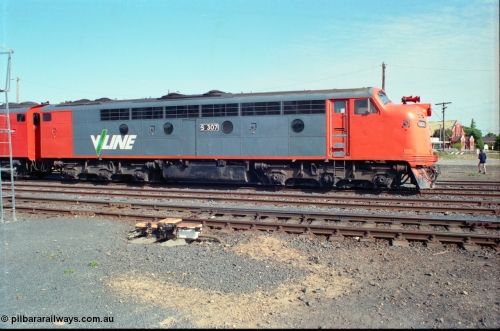 163-06
Seymour station yard, stabled V/Line down broad gauge Wodonga goods train in the rationalised yard behind the classic back to back pair of streamlined Bulldogs, S classes S 307 'John Pascoe Fawkner' Clyde Engineering EMD model A7 serial 57-171, motorised point machine and points in the foreground.
Keywords: S-class;S307;Clyde-Engineering-Granville-NSW;EMD;A7;57-171;bulldog;