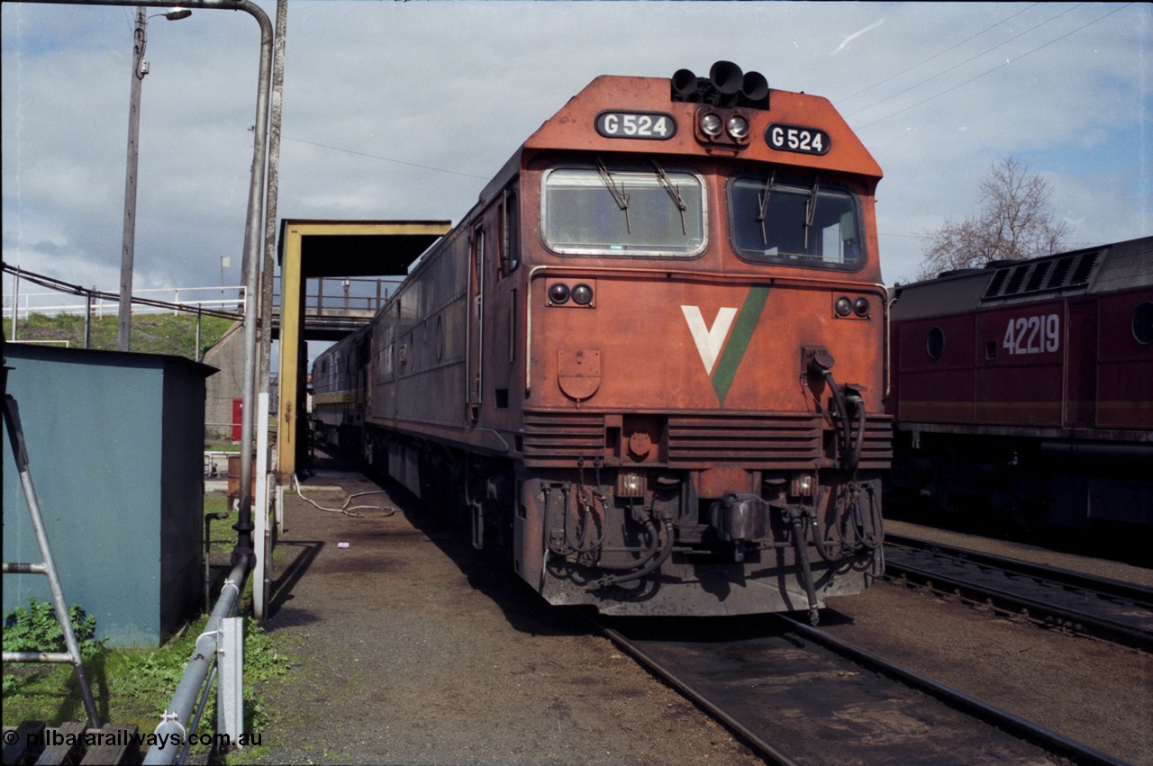 165-11
Albury loco depot, fuel point, standard gauge locos waiting refuelling and jobs, V/Line G class G 524 Clyde Engineering EMD model JT26C-2SS serial 86-1237 with NSWSRA 81 class 8175 Clyde Engineering EMD model JT26C-2SS serial 85-1094 with NSWSRA 422 class 42219 at right.
Keywords: G-class;G524;Clyde-Engineering-Rosewater-SA;EMD;JT26C-2SS;86-1237;