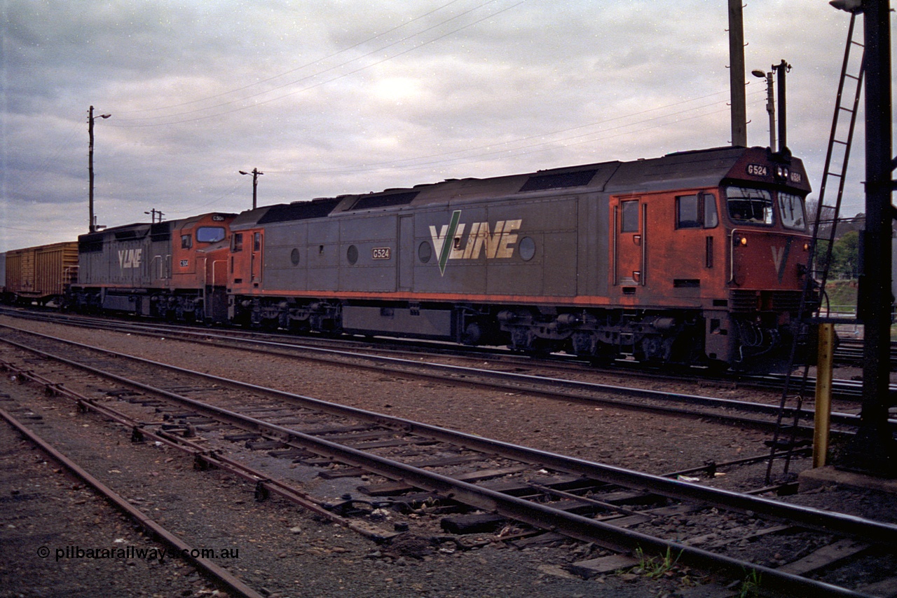 166-08
Albury, V/Line standard gauge G class G 524 Clyde Engineering EMD model JT26C-2SS serial 86-1237 and C class C 504 Clyde Engineering EMD model GT26C serial 76-827 depart the yard with an up goods train bound for Melbourne.
Keywords: G-class;G524;Clyde-Engineering-Rosewater-SA;EMD;JT26C-2SS;86-1237;