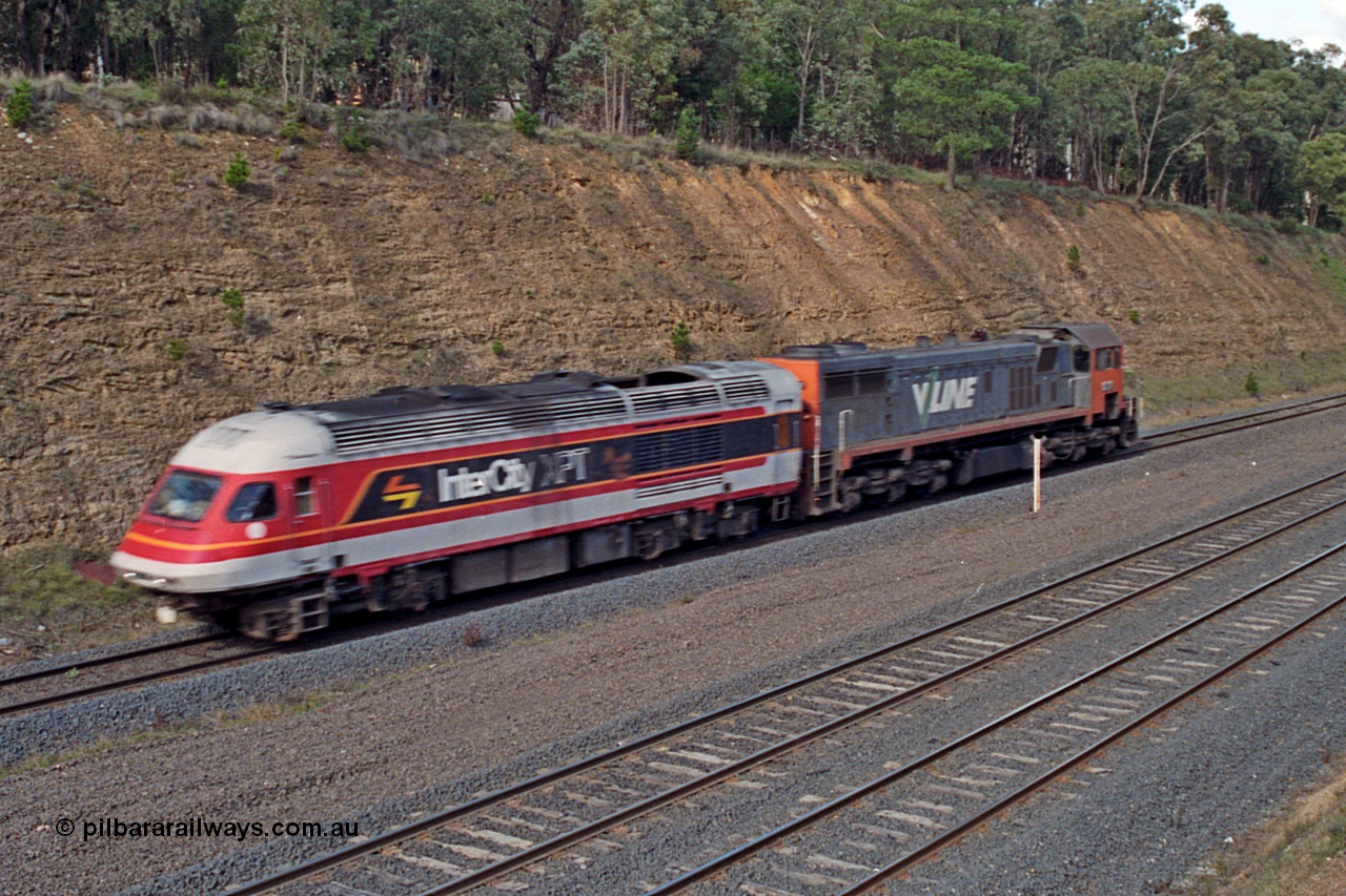 166-23
Heathcote Junction, V/Line standard gauge X class locomotive X 37 Clyde Engineering EMD model G26C serial 70-700 tows a damaged NSWSRA XPT power car to Melbourne.
Keywords: X-class;X37;Clyde-Engineering-Granville-NSW;EMD;G26C;70-700;