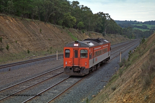 166-19
Heathcote Junction, down V/Line broad gauge passenger service to Seymour consisting of Tulloch Ltd built DRC class diesel rail car climbing up hill to the summit.
Keywords: DRC-class;Tulloch-Ltd-NSW;