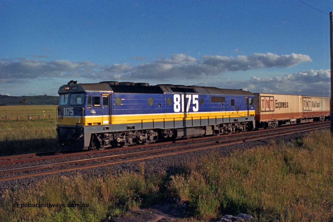 167-03
Wallan Loop, north bound standard gauge goods hauled by NSWSRA 81 class loco 8175 Clyde Engineering EMD model JT26C-2SS serial 85-1094 in the brand new Freight Rail 'Stealth' livery.
Keywords: 81-class;8175;Clyde-Engineering-Kelso-NSW;EMD;JT26C-2SS;85-1094;