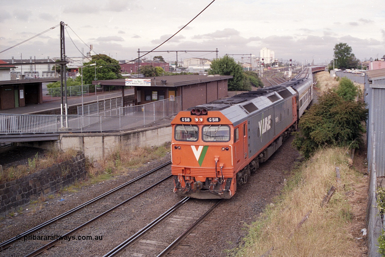 168-22
West Footscray, looking west toward Tottenham at broad gauge separation junction, V/Line standard gauge G class locomotive G 518 Clyde Engineering EMD model JT26C-2SS serial 85-1231 leads the up Melbourne Express passenger service from Sydney.
Keywords: G-class;G518;Clyde-Engineering-Rosewater-SA;EMD;JT26C-2SS;85-1231;