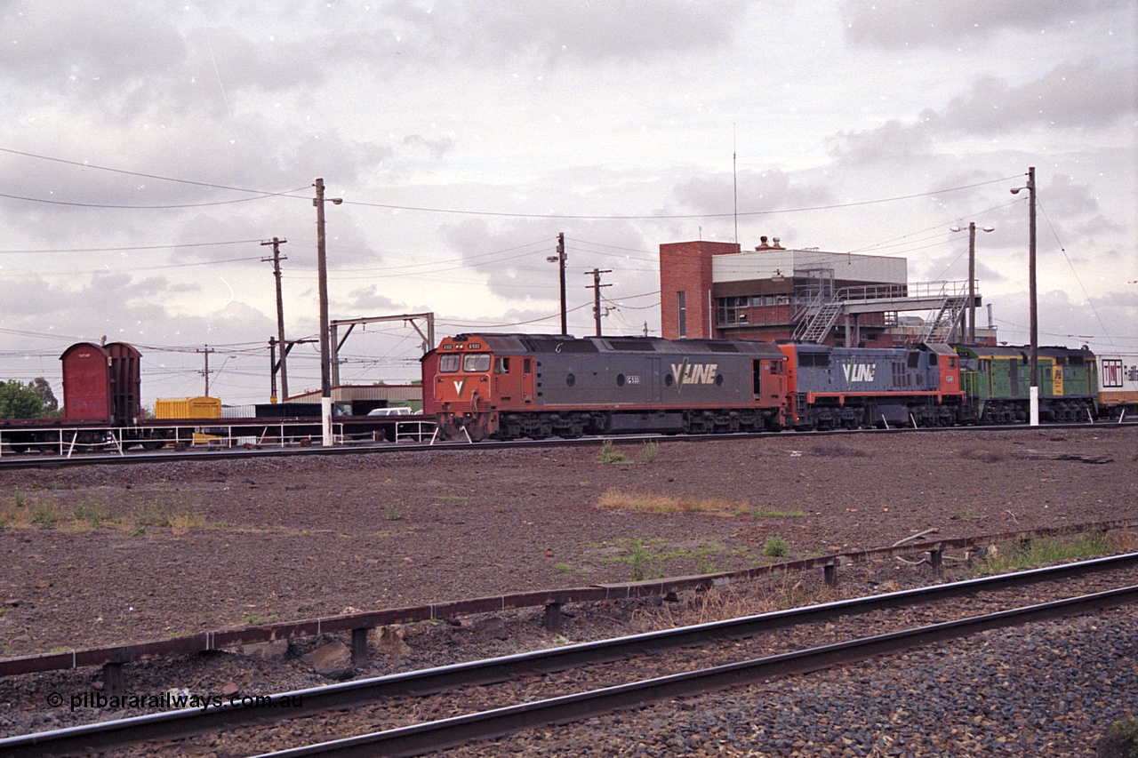 168-24
Tottenham Yard, an up broad gauge goods train with motive power from V/Line G class G 533 Clyde Engineering EMD model JT26C-2SS serial 88-1263, X class X 49 Clyde Engineering EMD model G26C serial 75-796 and Australian National 700 class 704 AE Goodwin ALCo model DL500G serial G6059-2 locomotives departs the yard for Melbourne.
Keywords: G-class;G533;Clyde-Engineering-Somerton-Victoria;EMD;JT26C-2SS;88-1263;