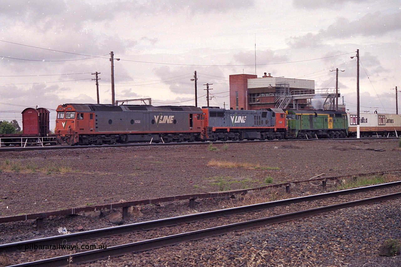 168-25
Tottenham Yard, an up broad gauge goods train with motive power from V/Line G class G 533 Clyde Engineering EMD model JT26C-2SS serial 88-1263, X class X 49 Clyde Engineering EMD model G26C serial 75-796 and Australian National 700 class 704 AE Goodwin ALCo model DL500G serial G6059-2 locomotives departs the yard for Melbourne.
Keywords: G-class;G533;Clyde-Engineering-Somerton-Victoria;EMD;JT26C-2SS;88-1263;