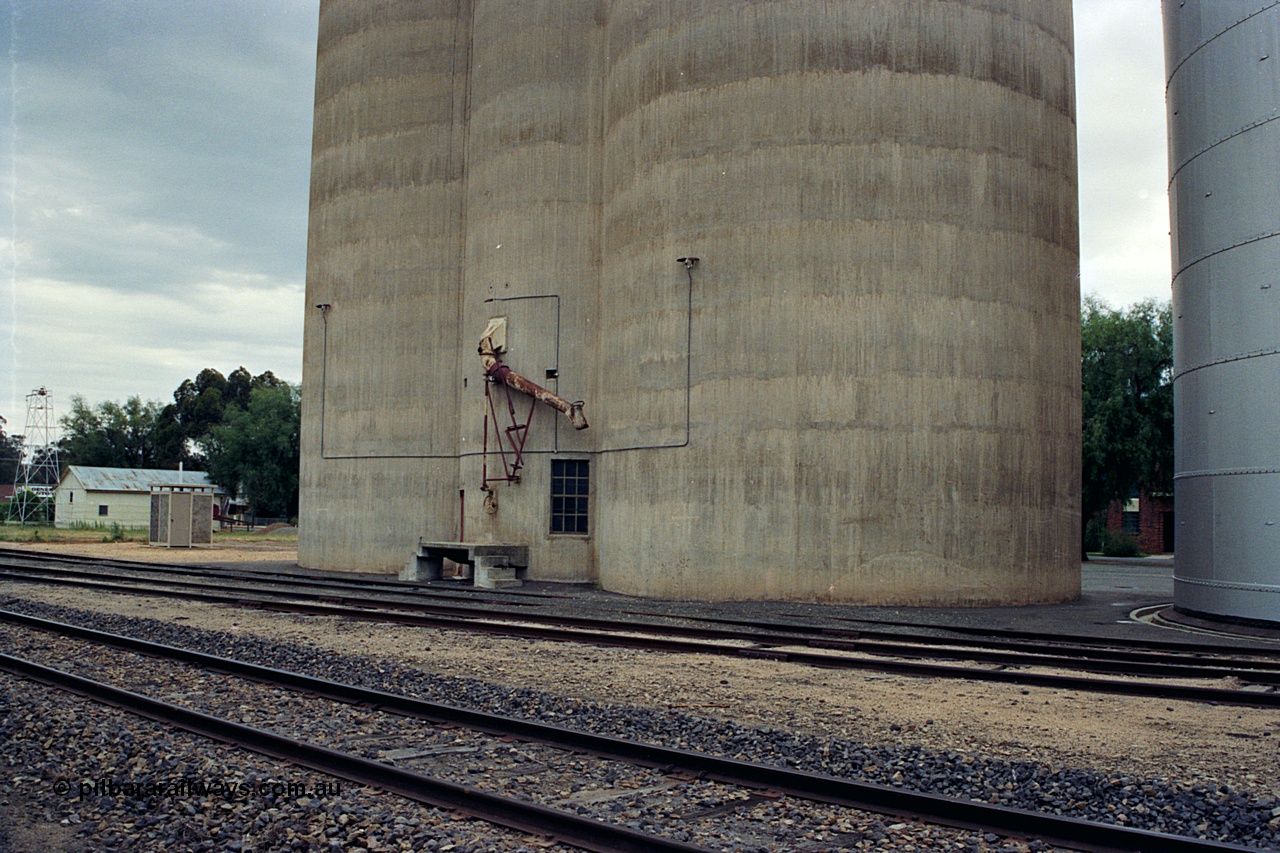 170-08
St James, track view across yard to Williamstown style silo complex, load-out spout, steel complex on the right, looking from former station platform.
