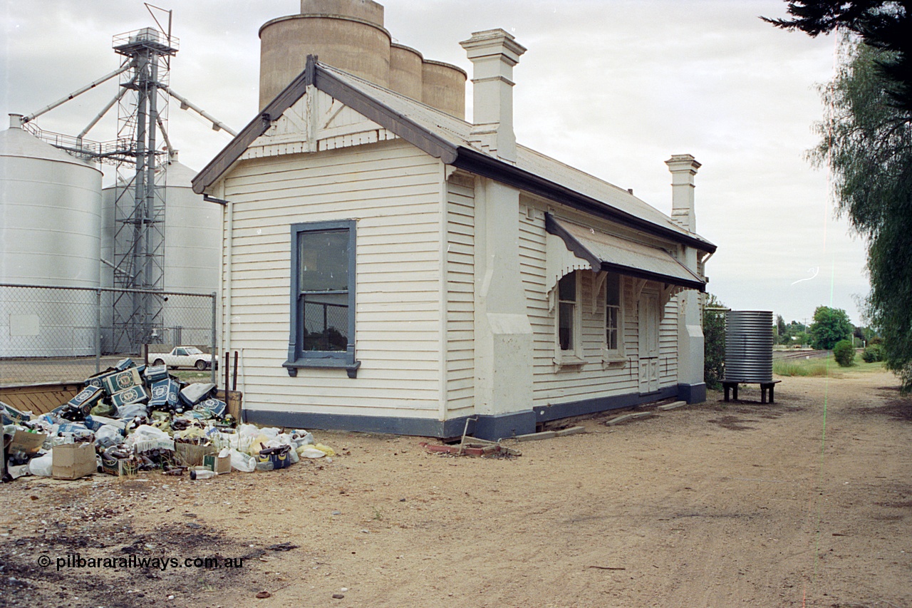 170-18
Goorambat, rear view of station building from car park, view across yard of Ascom and Williamstown style silo complexes.
