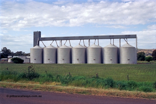 170-02
Dookie, Grain Elevators Board sub-terminal site, large Ascom style steel silo complex, located west of the station, viewed from road.
