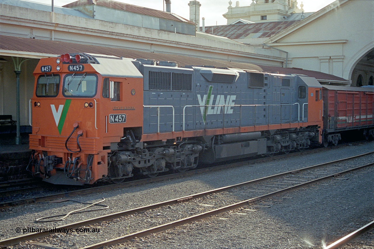 171-18
Ballarat station, V/Line broad gauge N class N 457 'City of Mildura' Clyde Engineering EMD model JT22HC-2 serial 85-1225, sitting at platform with an Up passenger train.
Keywords: N-class;N457;Clyde-Engineering-Somerton-Victoria;EMD;JT22HC-2;85-1225;