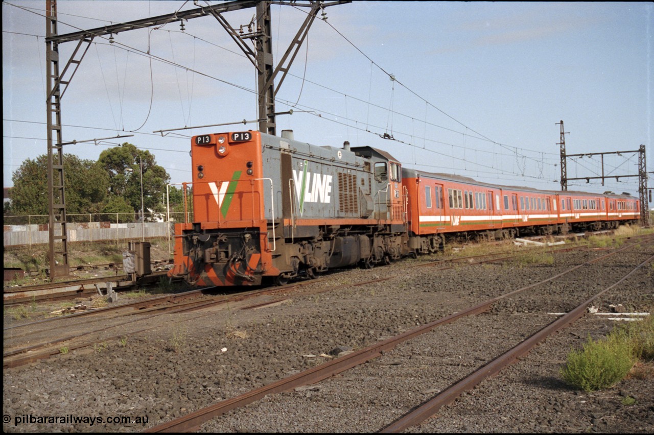 172-09
Sunshine, broad gauge V/Line P class P 13 Clyde Engineering EMD model G18HBR serial 84-1207 rebuilt from T 340 Clyde Engineering EMD model G8B serial 56-119 leads a 4 car H set into platform 3 with a down Bacchus Marsh passenger service.
Keywords: P-class;P13;Clyde-Engineering-Somerton-Victoria;EMD;G18HBR;84-1207;rebuild;